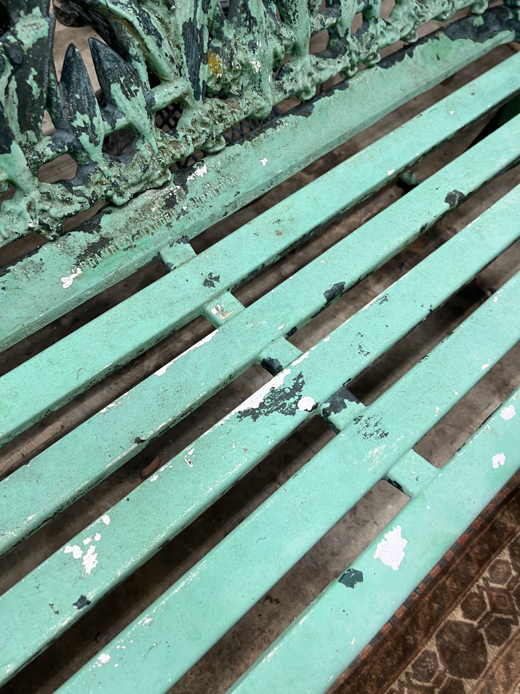 A Brambley Garden Furniture Lily of the Valley pattern cast aluminium garden bench, length 154cm, depth 45cm, height 84cm